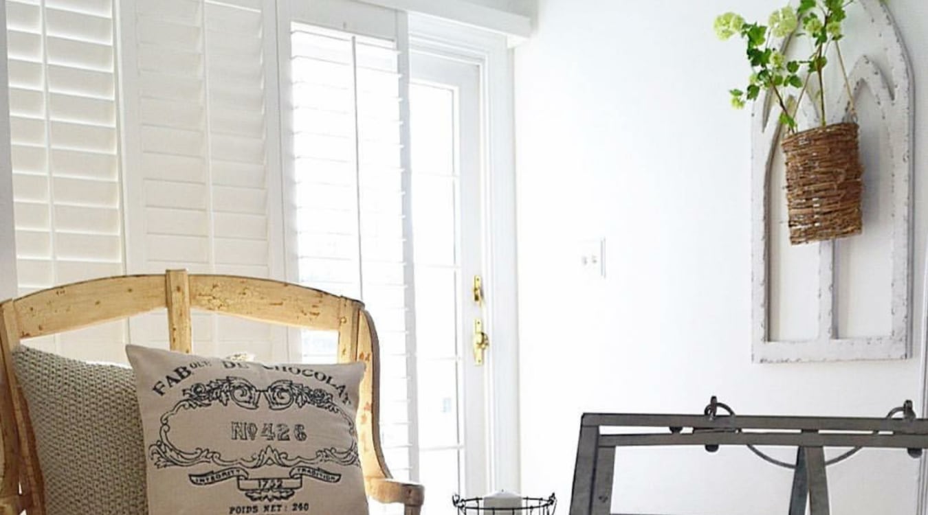 Plantation shutters in a boho styled sitting room